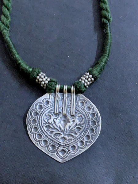 Repoussé Silver Pendant